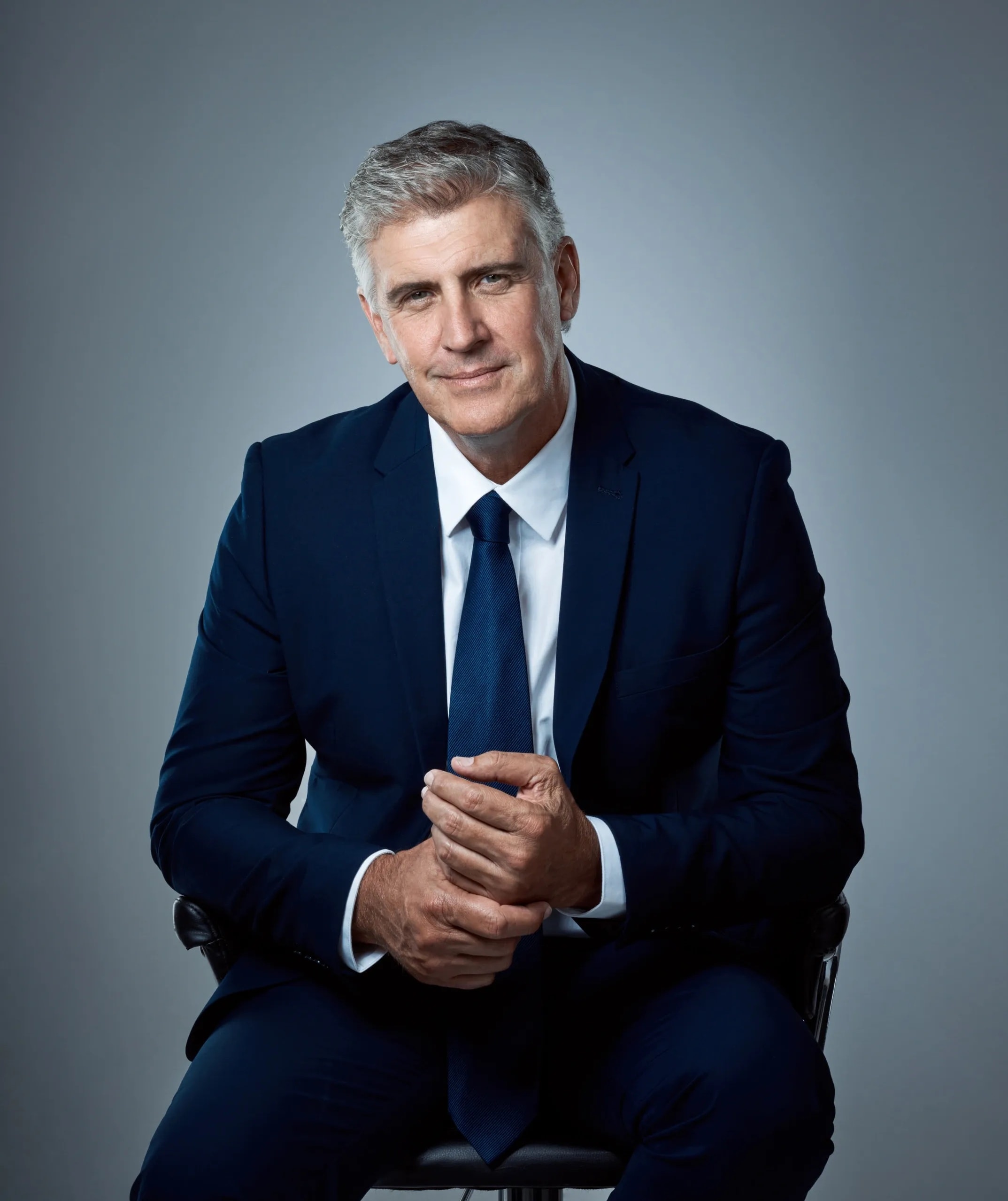 Executive professional in a considered editorial portrait